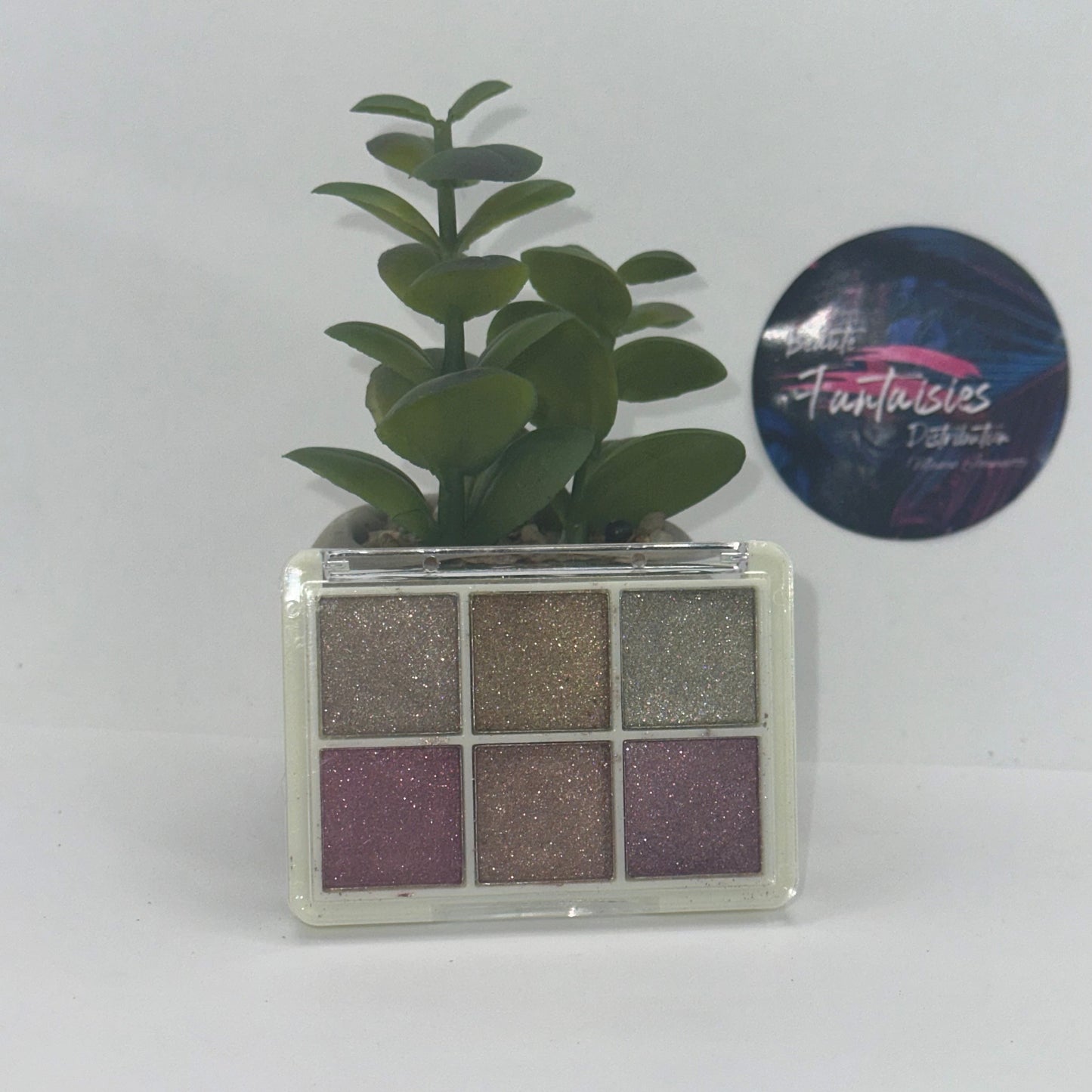 Boite de poudres compacts à effets chromes doré rosé