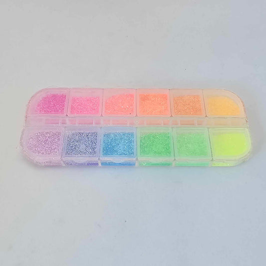 Boite de poudres libres à paillettes couleurs pastels